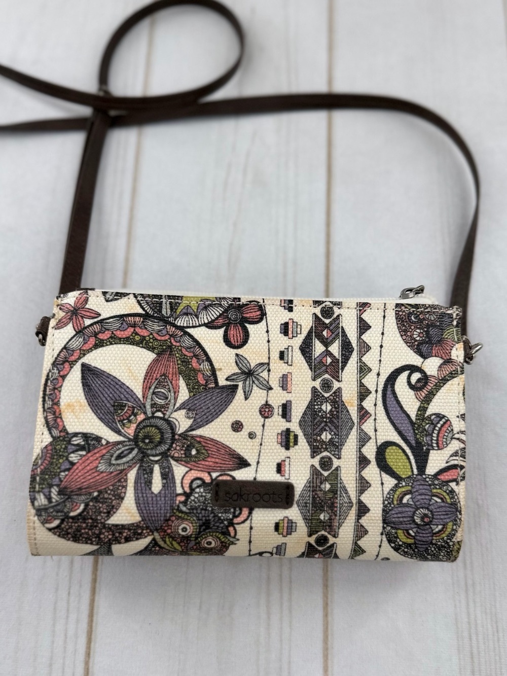 Sakroots Cream Floral & Paisley Crossbody with Brown Strap